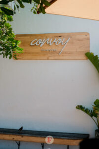 Exterior shot of signage of Convoy Commune Cafe