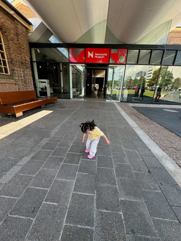 shot of toddler entering Newcastle museum