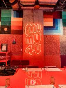 orange glowing signage of MuMu