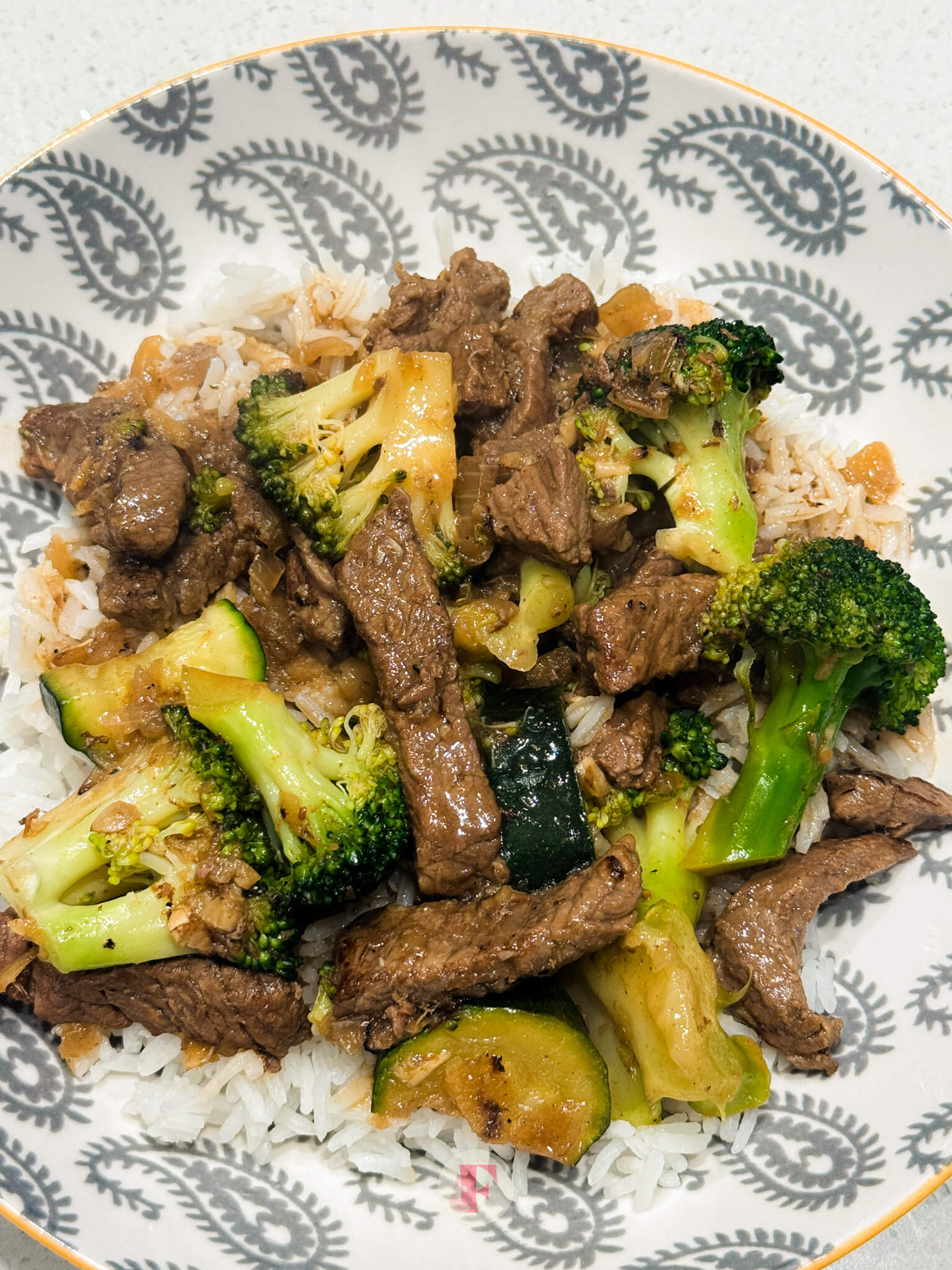 overhead shot of beef bicol express with broccoli